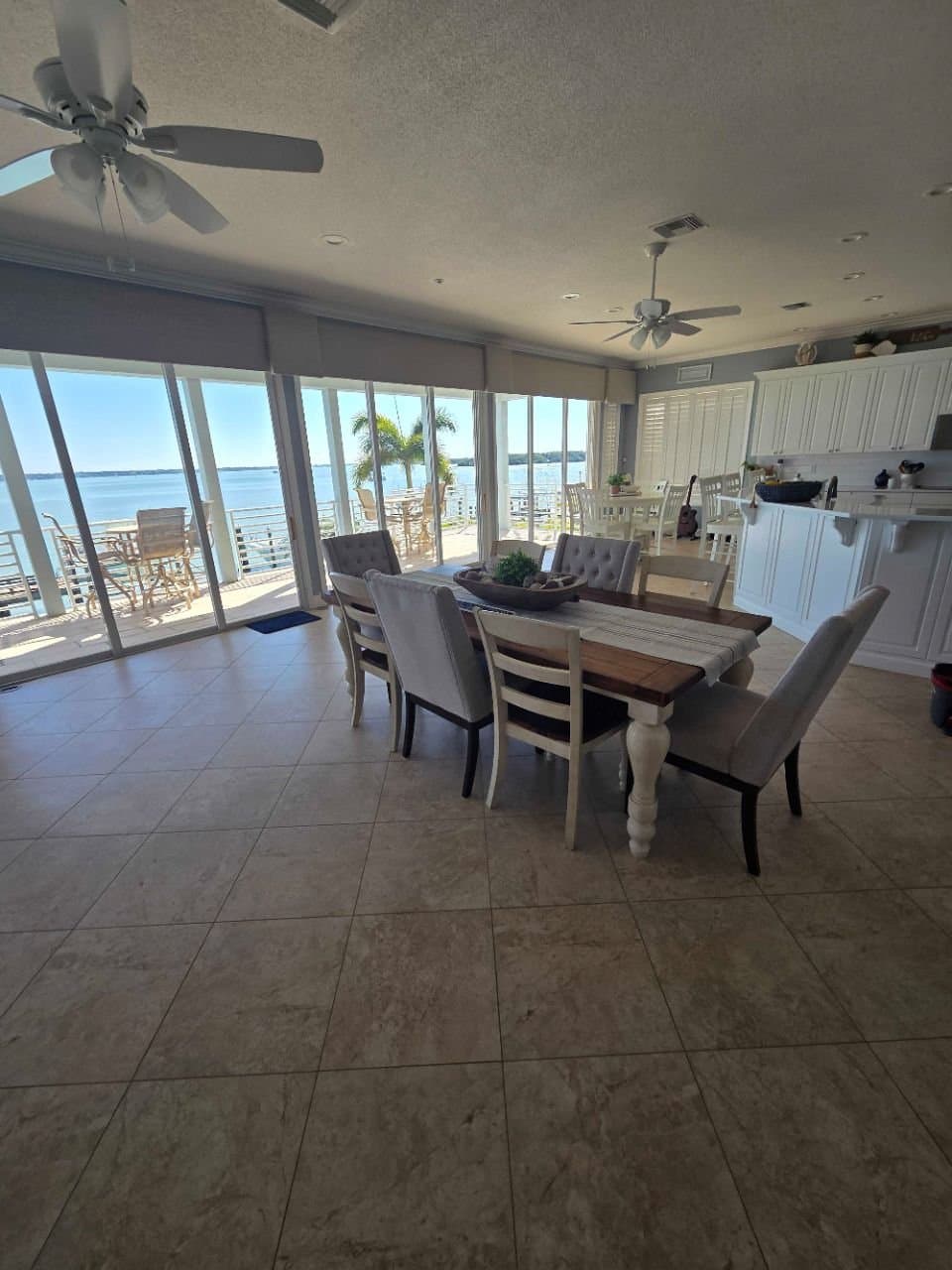 Beachfront condo dining and living area after a CLH turnover clean, gulf view