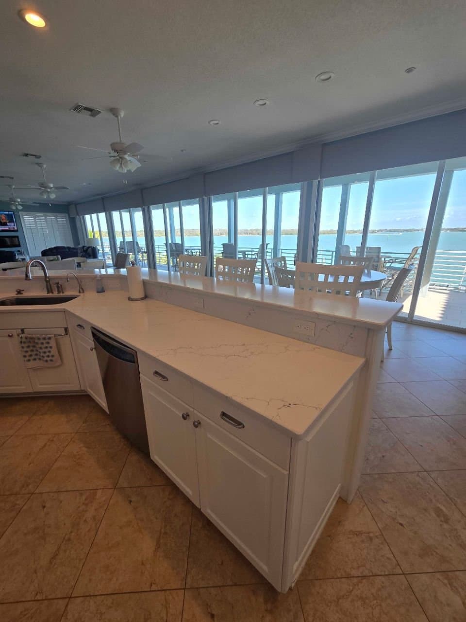 Kitchen island with panoramic water view after a turnover clean